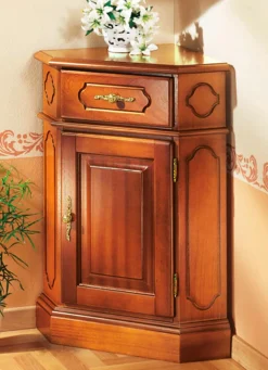 BADER Eck-Kommode mit eleganten, goldfarbenen Metallgriffen