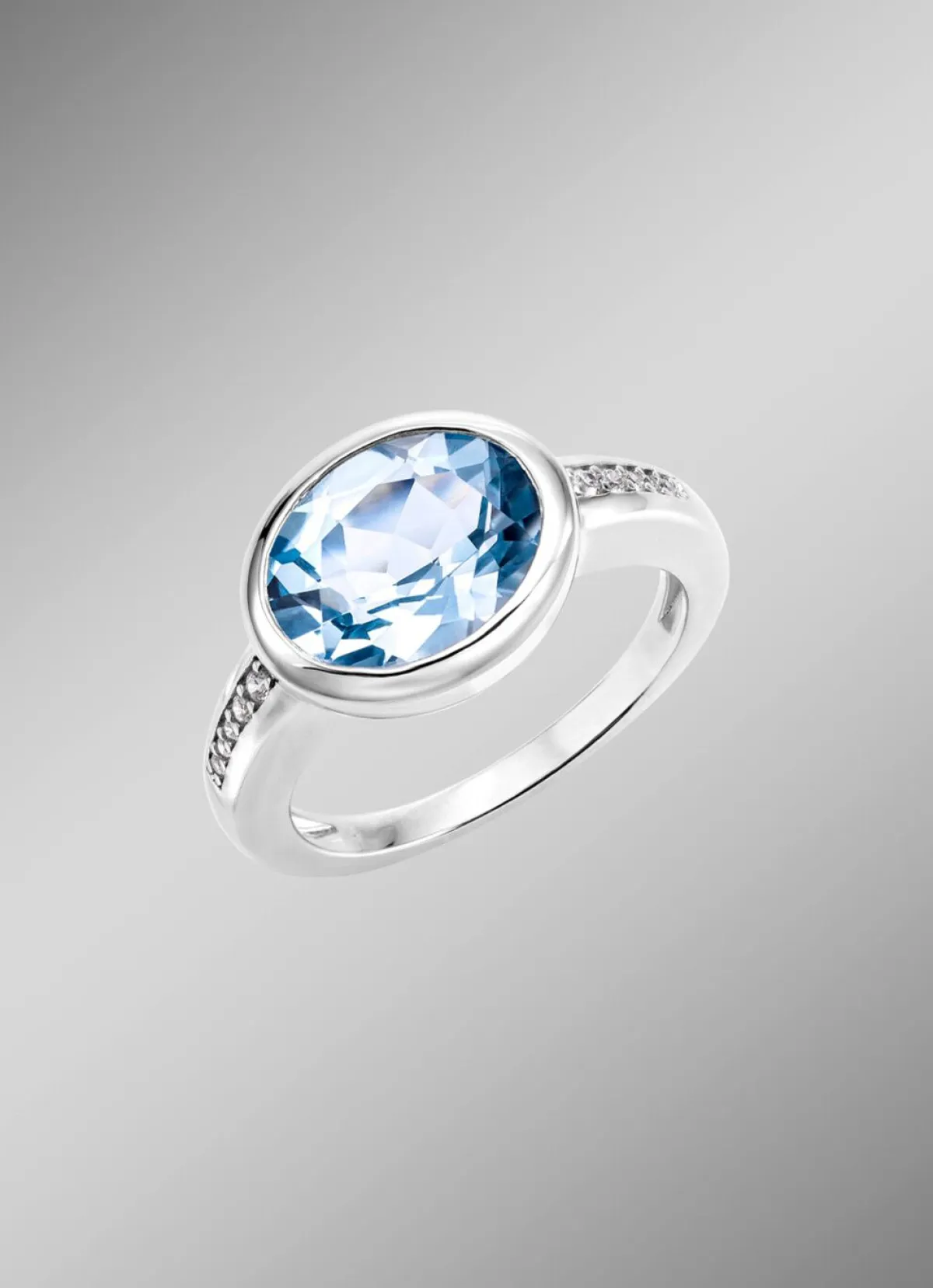 Damen BADER Schicker Damenring mit beh. Blautopas und synth. Zirkonia